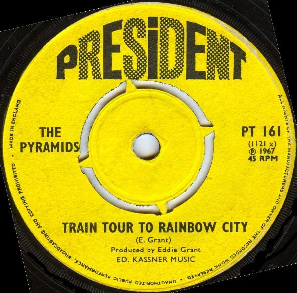 The Pyramids  - Train Tour To Rainbow City / John Chewey